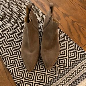 Marc Fisher pointy toe, low cut suede bootie with stacked heel. Side zip Taupe
